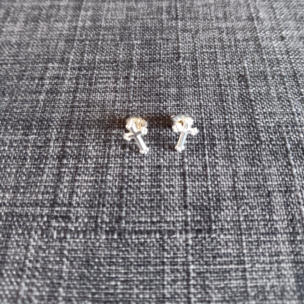 Dainty silver colored cross earrings for pierced ears